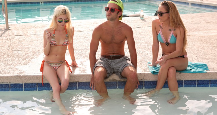 Piper and Hollie hang out by the pool